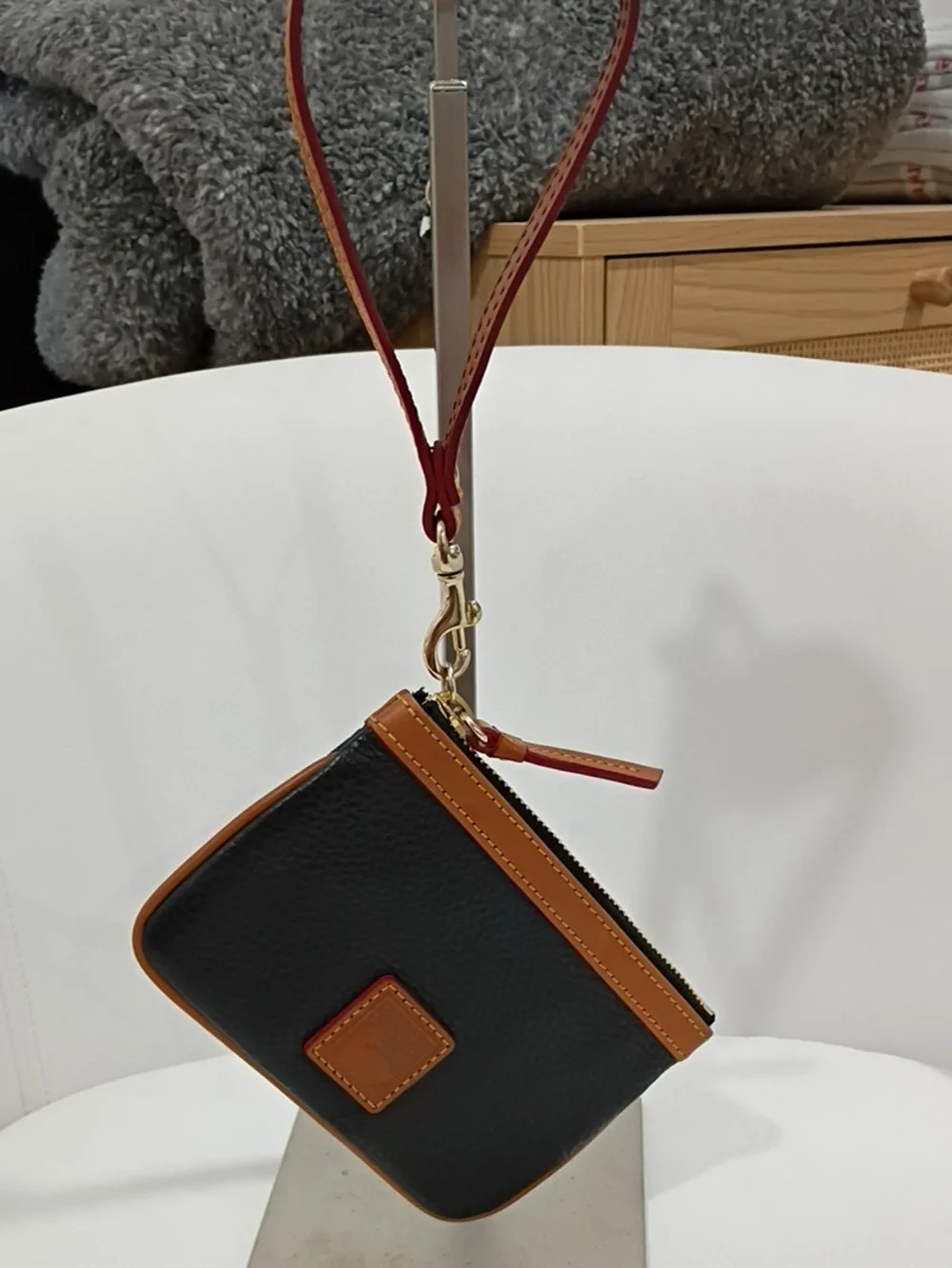 Dooney & Bourke Black and Tan Pebbled Leather Wristlet Pouch